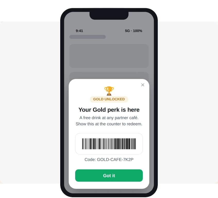 In-app message 'Your Gold perk is here' with a GOLD UNLOCKED badge, a barcode, and the code GOLD-CAFE-7K2P